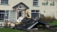 Man drove bulldozer over parked car and smashes into pub