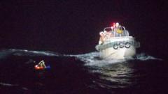Patrol ship rescuing a seaman