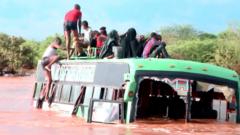Watch: Bus passengers rescued from flood waters in Kenya