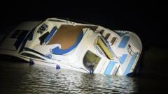 Six people 'in real peril' saved from sinking boat