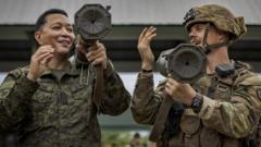 US and Philippine troops take part in weapons training during the 'Balikatan' or 'shoulder-to-shoulder' US-Philippines joint military exercises in Fort Magsaysay on April 13, 2023 in Nueva Ecija, Philippines.