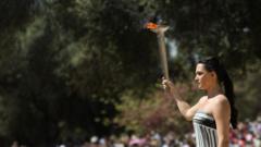 Cloudy skies stop sun sparking Olympic torch journey