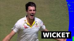 Cummins removes Root for 21 before lunch