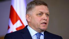 Slovak PM in surgery and 'fighting for his life' - minister