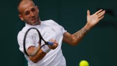Evans wins first Wimbledon match for four years