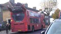 Two in hospital after bus roof 'taken off by tree'