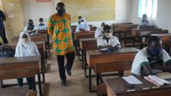 Officials of di Ministry of Basic and Secondar School for The Gambia visit schools for 24 June