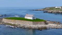 Tiny church in the sea where brides worry about high tide making them late to the altar