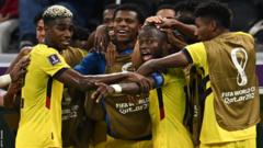 Ecuador players celebrate Enner Valencia's (centre-right) goal against Qatar