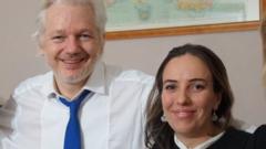 Undated handout photo issued by WikiLeaks shows Julian Assange with his partner Stella Morris