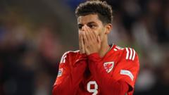 Wales forward Johnson to miss Croatia game