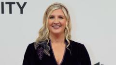 Rebecca Adlington, smiling, looking at the camera at a celebrity event