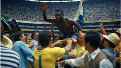 Pele carried by the crowd after winning the 1970 World Cup