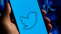 In this photo illustration the Twitter logo seen displayed on a smartphone