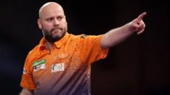 Kist loses despite nine-darter & spectator wins £60k