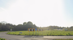 Motorcyclist dies after roundabout crash