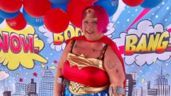 Disabled woman takes on superhero themed triathlon