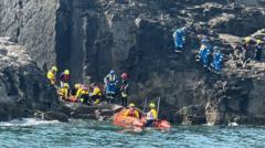 Boy rescued after falling on rocks while coasteering