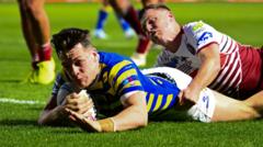Wire beat Wigan to keep pace with leaders Leeds