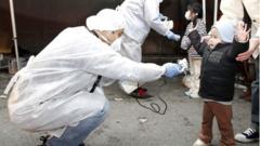 Children are tested for radiation following damage to the Fukushima nuclear plant after the Japanese tsunami and earthquake of March 2011.