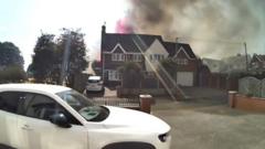 Doorbell captures flames leaping above home's roof