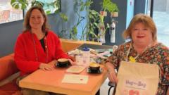 Friends give out 'hug in a bag' to cancer patients
