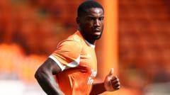 Cambridge sign Blackpool striker Kouassi on loan