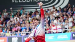 Robertson breaks Games record to win cycling gold