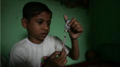 MUMBAI, INDIA - NOVEMBER 8, 2007: Diabetic Ajay Jadhav (10) takes insulin injections himself and follows a diet drawn up his mother Laxmi Vijay Jadhav. (Photo by Vijayanand Gupta/Hindustan Times via Getty Images)