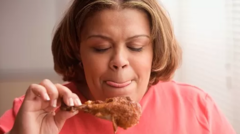 woman hold chicken