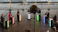 Feisty exchanges over NHS as party leaders go head-to-head in live debate