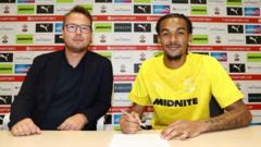 Saints sign USA forward Downs for £7m 