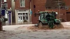 Man arrested over tractor drive through floods