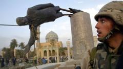 سقوط تمثال صدام حسين في بغداد