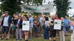 Thousands oppose plans to build on green belt land