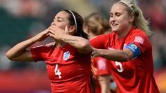 Fara Williams celebrates