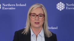 Politicians must 'throw everything' at tackling racism, FM says