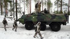 PM to push ahead with controversial defence plan despite resignation