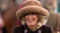 Queen visits Cheltenham after early snow on course