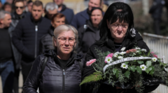 Thousands gather to mourn North Macedonia nightclub fire dead