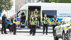Police break up row after dead woman's family confront mechanic who falsified MOT