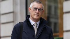 Ex-Post Office boss sorry over jailed mother email