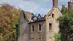 Roof and chimney at fire-hit derelict school to go