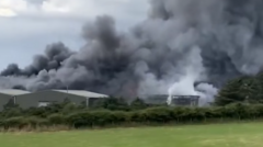 Fire breaks out at north east landfill site as thick smoke billows near road