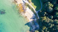 Beachgoers seriously injured in suspected racially-motivated assault