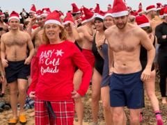 Watch: Hundreds run into sea at Boxing Day dips