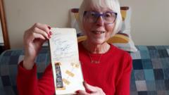 Beatles for sale as autograph album up for auction