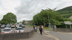 Head teacher charged after alleged attack at school