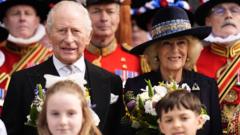 King and Queen give away money in ancient Easter tradition