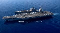 Venezuela's Maduro says US 'fabricating war' as it deploys world's largest warship